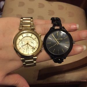Two Michael Kors watches.